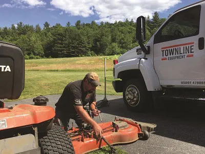Townline Equipment's service department work on a Kubota lawn tractor