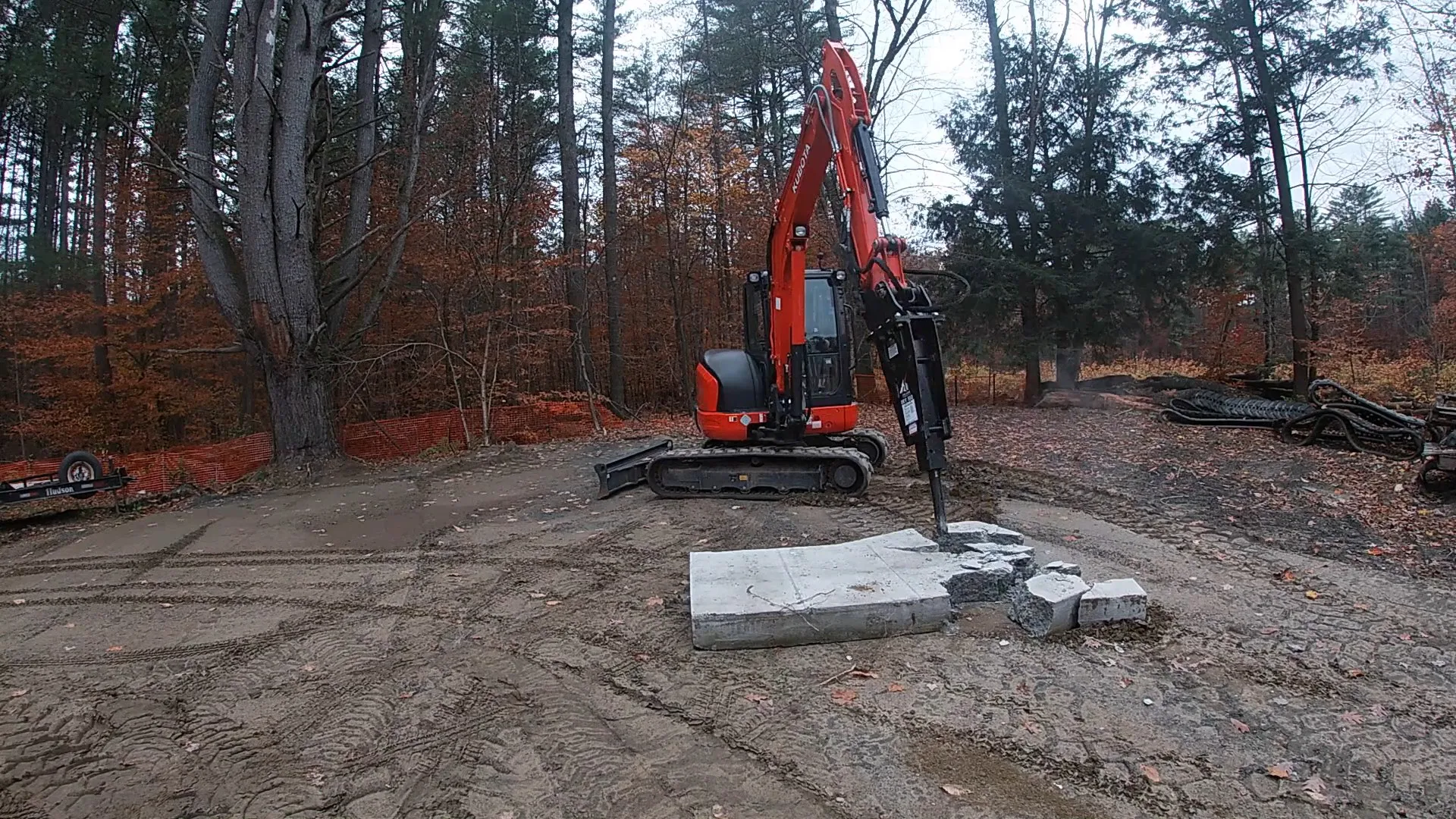 Kubota KX057 Excavator Paired With an Okada Hydraulic Breaker
